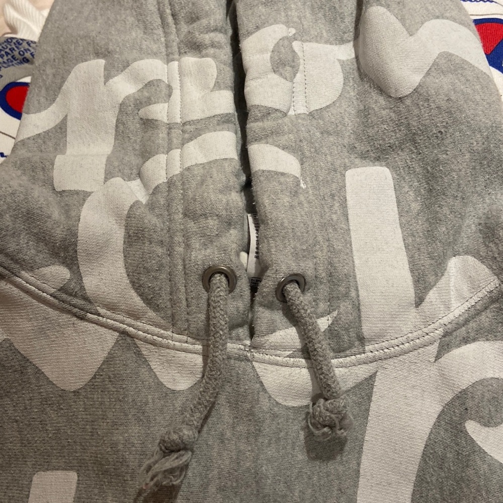 Gray champion sweatshirt with white logo